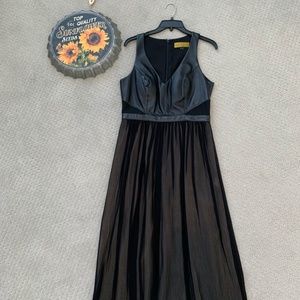 NICOLE MILLER : Size 8 Black cocktail dress with leather bodice and trim.